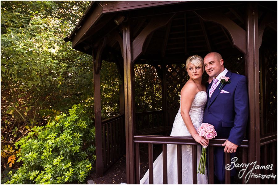 Beautiful intimate photos of the bride and groom around the gardens at The Fairlawns in Walsall by Fairlawns Wedding Photographer Barry James