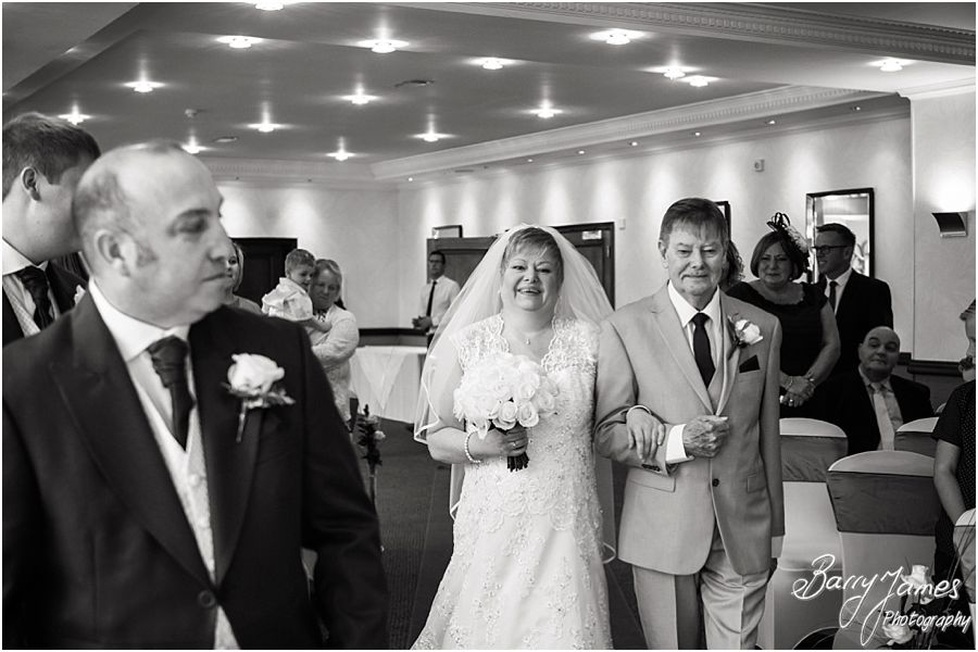 Capturing the emotions of the Bridal entrance to the ceremony at The Moat House in Acton Trussell by Stafford Wedding Photographer Barry James