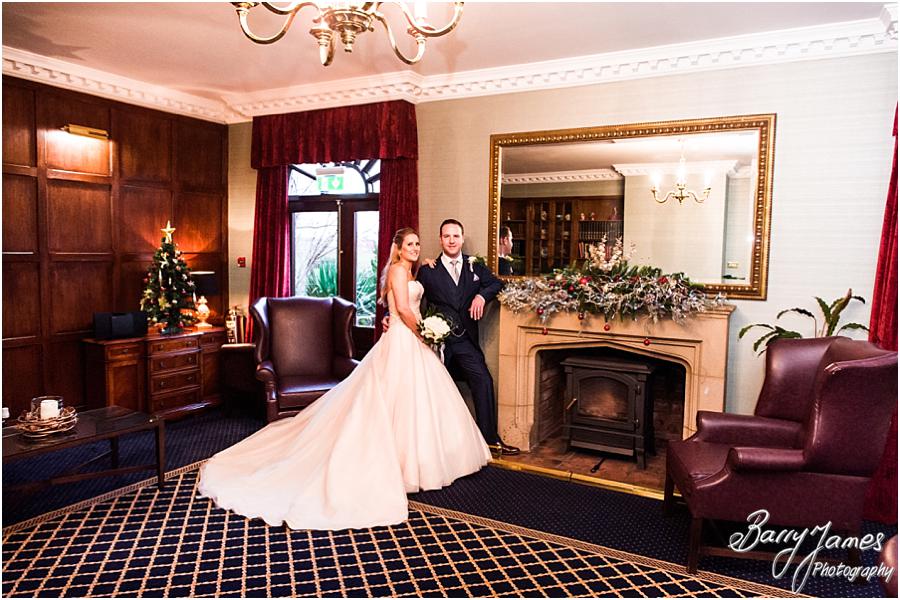 Beautiful relaxed portraits of the bride and groom for their Christmas wedding at The Moat House in Acton Trussell by Wolverhampton Wedding Photographer Barry James